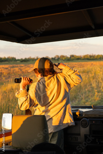 Family experiencing a mobile safari, Okavango Delta, Botswana, Africa