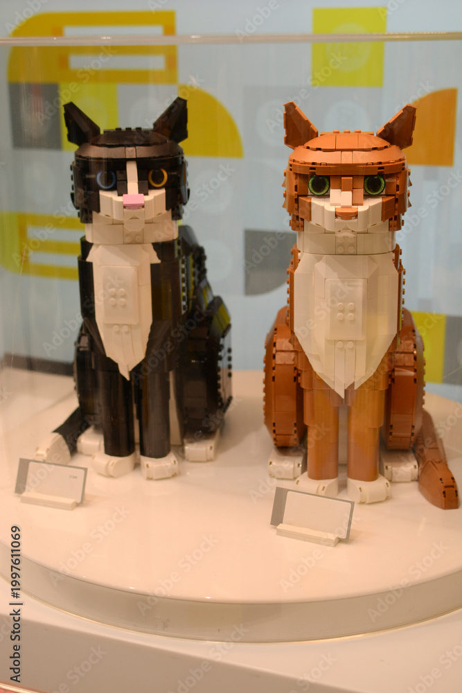 Fototapeta premium Cat figurines made from Lego bricks. Toy plastic cats.