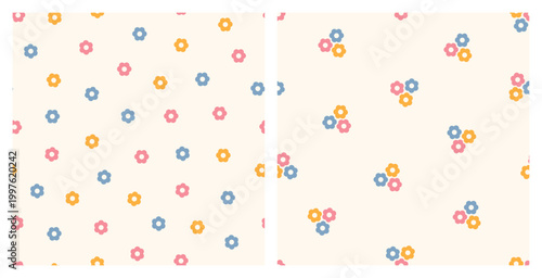Two Floral Seamless Vector Patterns with Multicolored Simple Daisy Flowers
