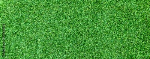 green grass texture background. panorama of green-artificial turf flooring texture.
