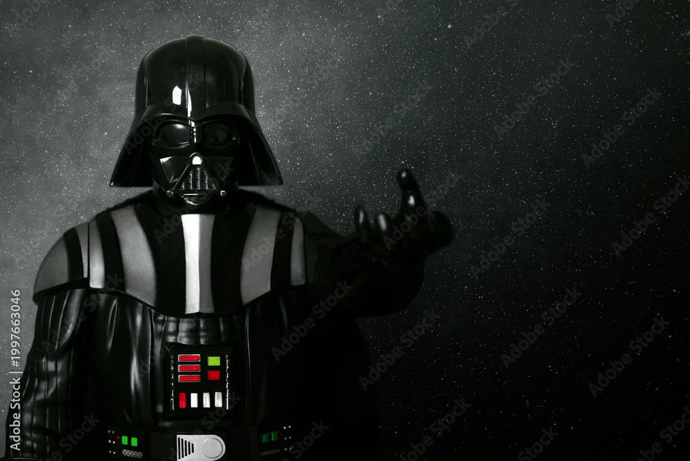 Obraz premium Darth Vader action figure character from the Star Wars movie saga and space for text. Illustrative editorial