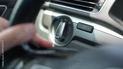 Hand using car turn signal lever indicator slow motion