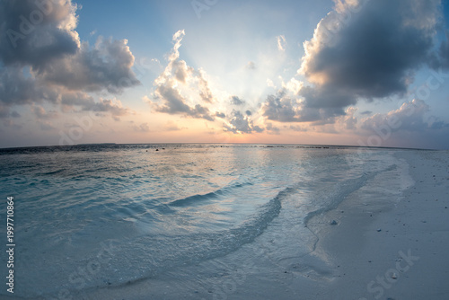 Fényképezés Sunset over tiny uninhabited Maldives island with white sand and dramatic colorf