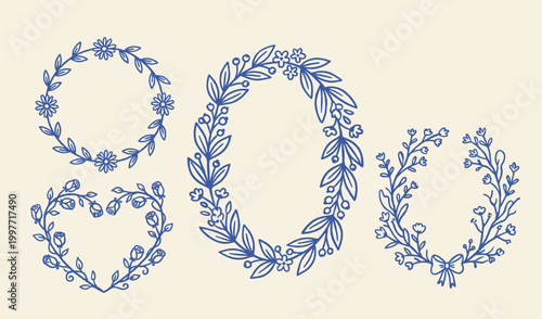 Hand drawn floral wreath collection with heart and oval shapes in elegant blue ink style