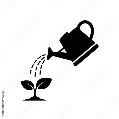 Watering can pouring water on a small plant, nurturing growth and life.