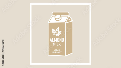 Almond milk carton with logo sits on table indoors closeup