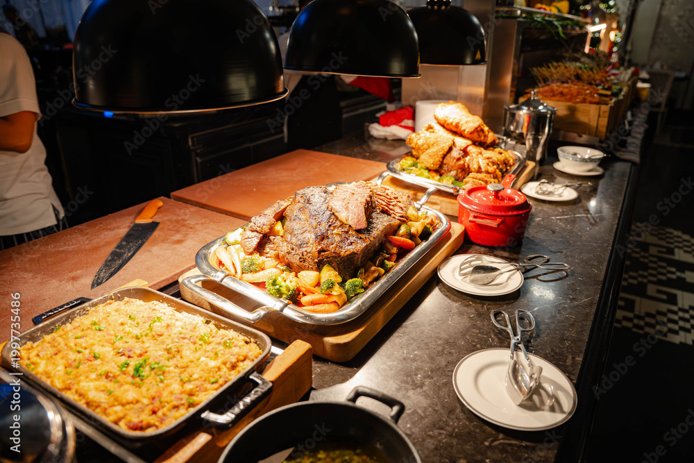 Naklejka premium close-up view of a professional carvery station at an upscale buffet