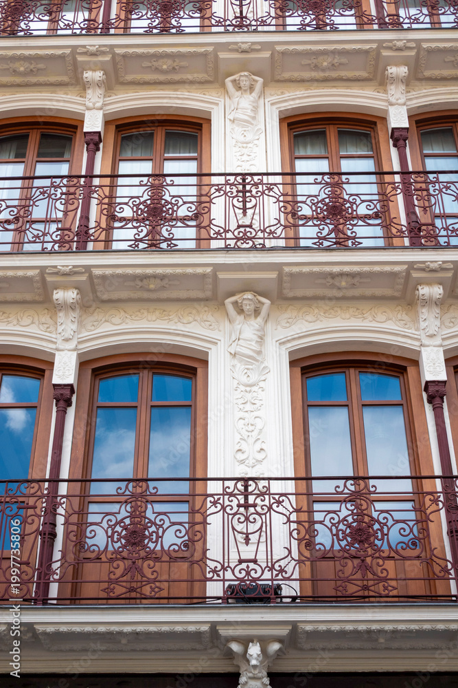 Obraz premium Architectural detail of a beautiful old building in the historic center of Toledo, a tourist city in Castile La Mancha, Spain.