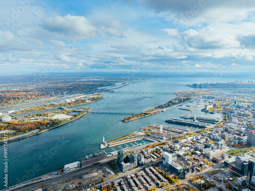 Canvastavla Aerial view of Montreal with bridges over St Lawrence River, autumn colors, Old Port and marina skyline