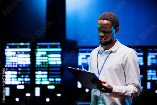 Принти на полотні Technician doing annual maintenance, helping prolong equipment life span and avoiding downtime