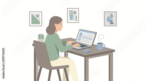Woman working at a wooden desk with laptop, coffee, and artwork on the wall.