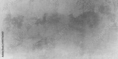 A vintage textured backdrop featuring a dark aged grunge metal and concrete wall surface with a rough grey stone pattern for a dirty industrial design