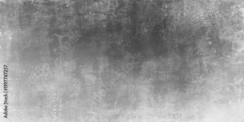 A dark aged metal surface features a rough grunge texture with a dirty vintage pattern and gray concrete design for an old textured backdrop