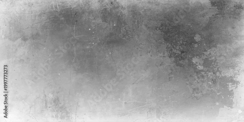 A grungy gray textured cement wall features a vintage pattern of water drops on a dark stone surface creating an old black and white rough concrete background design