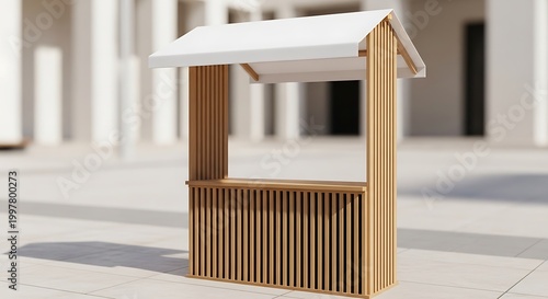 Wooden outdoor kiosk with white roof, perfect for selling goods in a sunny environment.