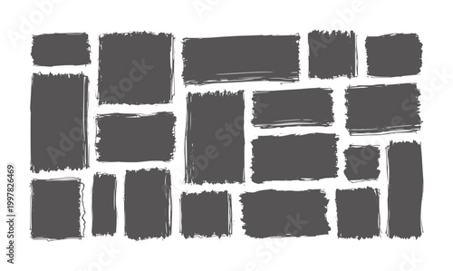 Collection of dark gray textured rectangular brush stroke shapes