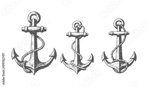 Three vintage nautical anchors with ropes white maritime