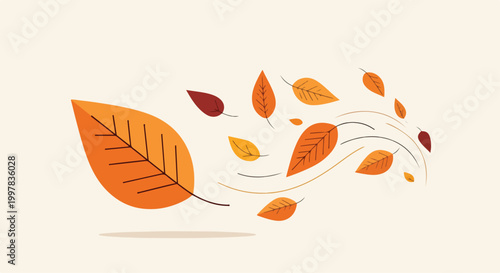 фотографія A large orange leaf blowing away smaller leaves