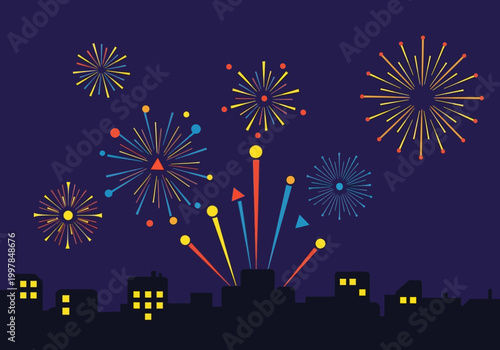 Explosion of colorful fireworks illuminating the night sky above a silhouetted cityscape