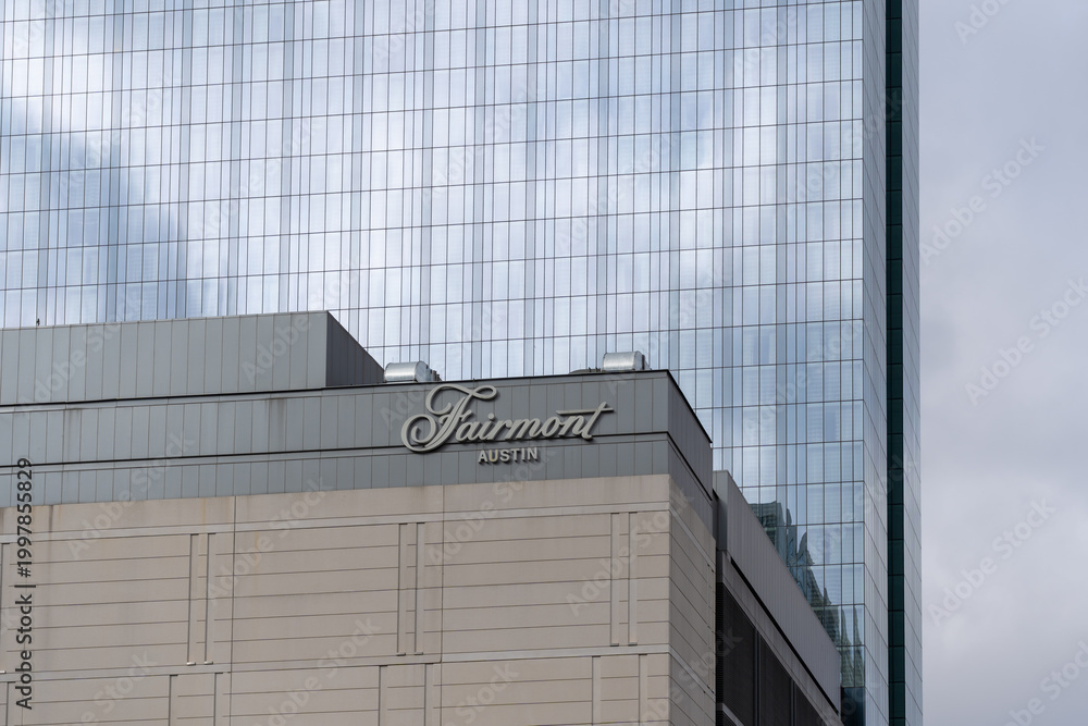 Fototapeta premium Austin, Texas, USA - March 17, 2022: Fairmont Austin sign on the building in Austin, Texas, USA. Fairmont Hotels and Resorts is a global chain of luxury hotels headquartered in Toronto. 
