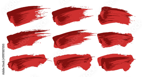 Collection of textured red brush strokes, artistic and grunge elements, perfect for design accents, isolated on a white background.