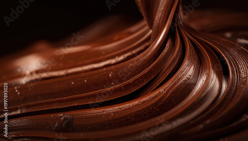 Velvety chocolate swirl closeup with rich texture and glossy sheen