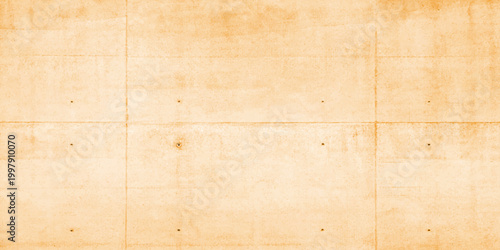 A blank antique parchment with a grunge texture lies on a rough aged wooden surface creating a vintage brown paper background with a dirty retro design pattern
