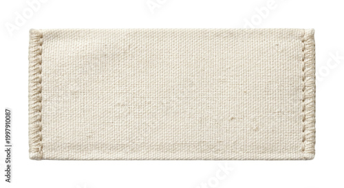 Vászonkép Blank white textile clothing label with stitched edges