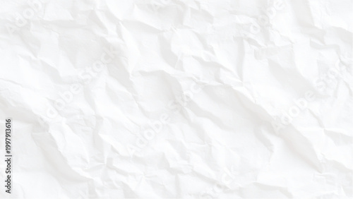 Crumpled white paper texture background with creases and folds