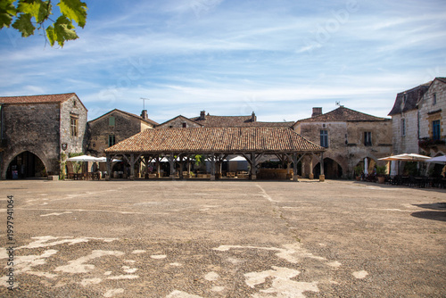 Historic wooden market hall in the medieval square of Monpazier