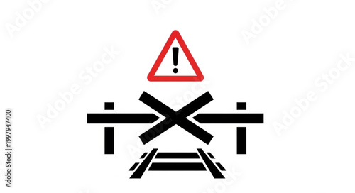 Railroad crossing warning sign with barrier and tracks.
