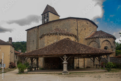 Historic Church of Saint-Jean-Baptiste with Covered Market in Saint-Jean-de-Cole, France.