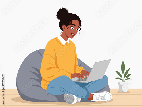 Happy Young Woman Working Remotely on Laptop from Home Office