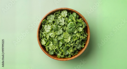 Fresh broccoli florets in terracotta bowl
