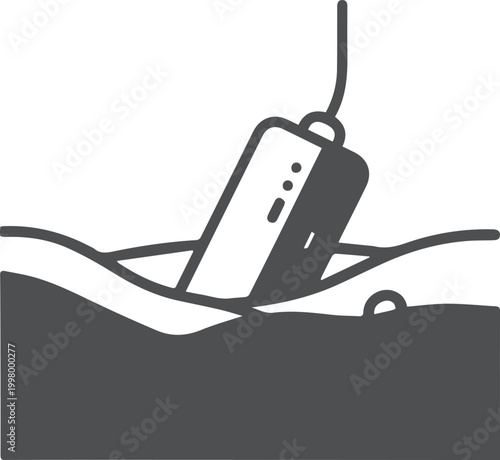 Fishing lure submerged in water, line above