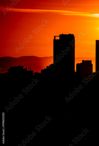 Konstfotografi Sunset Over Ulaanbaatar Skyline With Silhouetted Buildings and Mountains