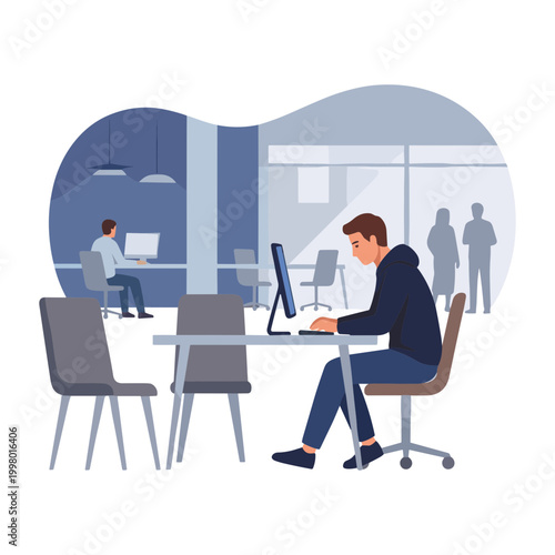 Man working on computer at office desk with coworkers nearby indoors
