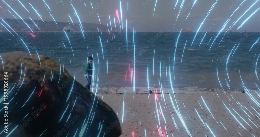 Obraz premium Standing child in green hooded jacket facing waves at shore, mossy rock and cyan-magenta streaks