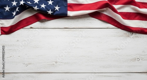 American flag waving on rustic white wooden background symbolizing patriotism and freedom