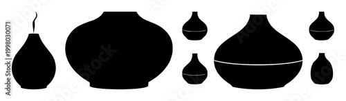 Aromatherapy oil diffuser set with solid black icon on white background featuring aromatherapy, oil, diffuser with wellness and relaxation