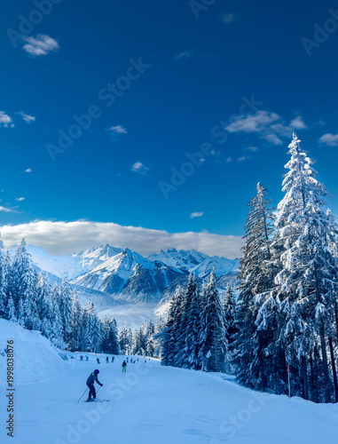 Cuadro en lienzo Ski slope in the winter landscape in the ski region Silvretta Montafon in Vorarlberg, Austria