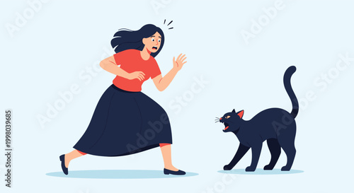 Terrified woman running away from an aggressive black cat that is hissing and arching its back in an outdoor setting.