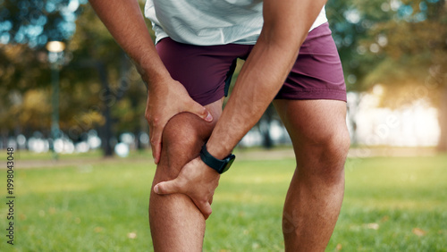 Tableau sur toile Hands, knee pain and sore at park, fitness and athlete with sprain after exercise or muscle tension