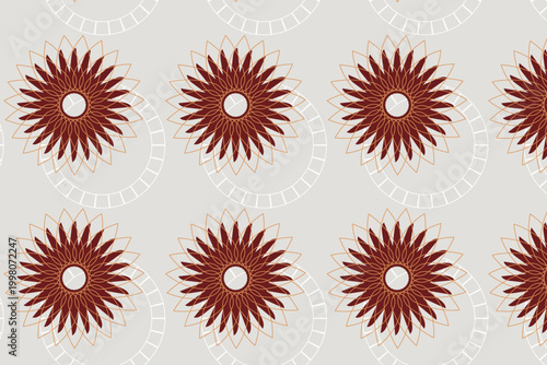Vibrant rust-colored sunbursts with intricate spiked petals repeat over a light grey base, offering a bold retro look for mid-century modern interiors.