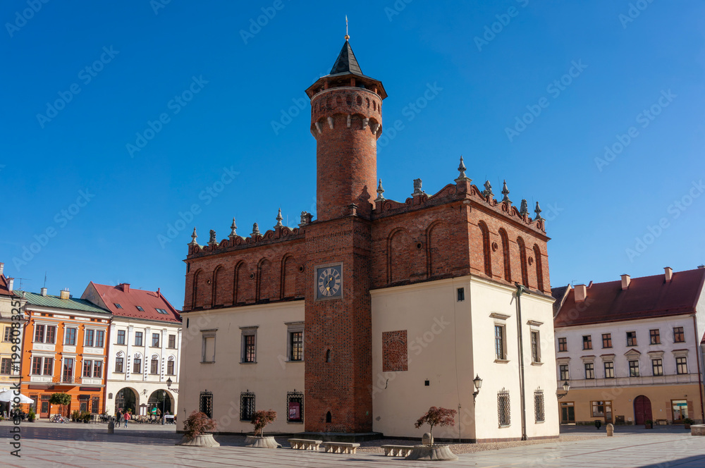 Obraz premium Town Hall (Ratusz) - historic building situated in center of Market Square (Rynek Miejski), one of most distinctive landmarks of city. Tarnów, Poland.