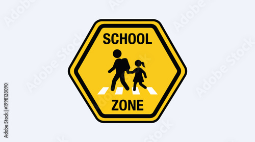 Vibrant yellow hexagonal road sign marking a school zone, depicting silhouettes of an adult and child crossing, an essential symbol for pedestrian safety near educational institutions