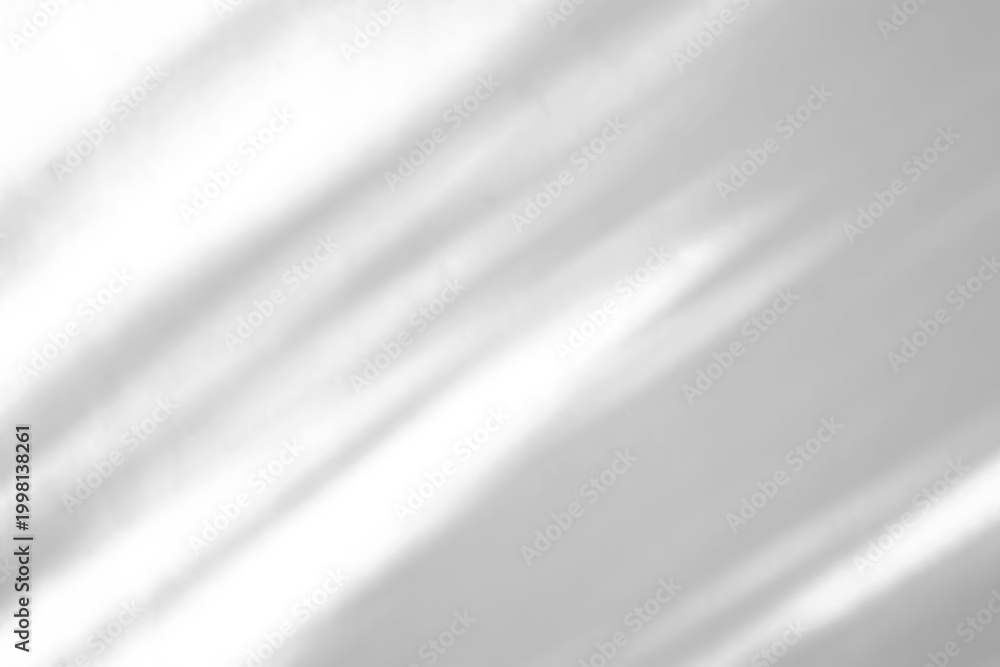 Obraz premium Soft Diagonal Window Shadows on Minimalist White Textured Wall Background