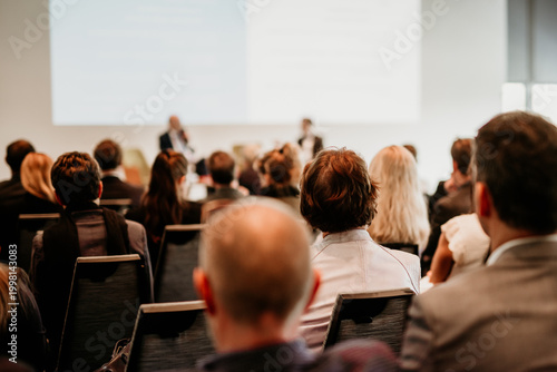 Interview and round table discussion at business convention and presentation. Audience at the conference hall. Business and entrepreneurship symposium.