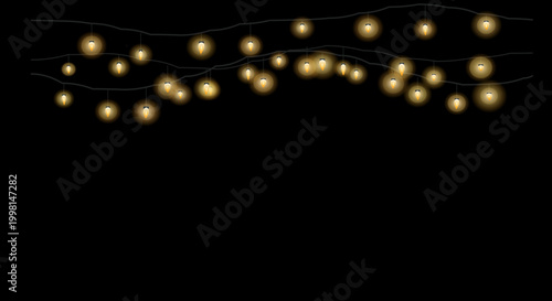 Glowing string lights in warm golden lighting on black background for festive decoration