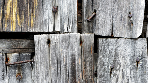 Wooden texture old boards. vintage boards and old rusty nails. Abstract texture of old boards. the wood is destroyed. wood texture. knots, imperfect surface. background